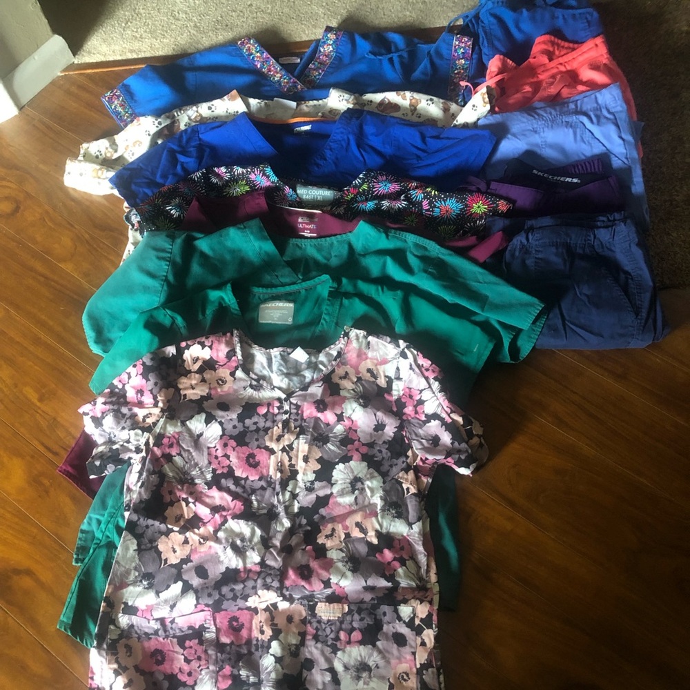 10 scrub tops xl, lg.  5 scrubs bottoms lg